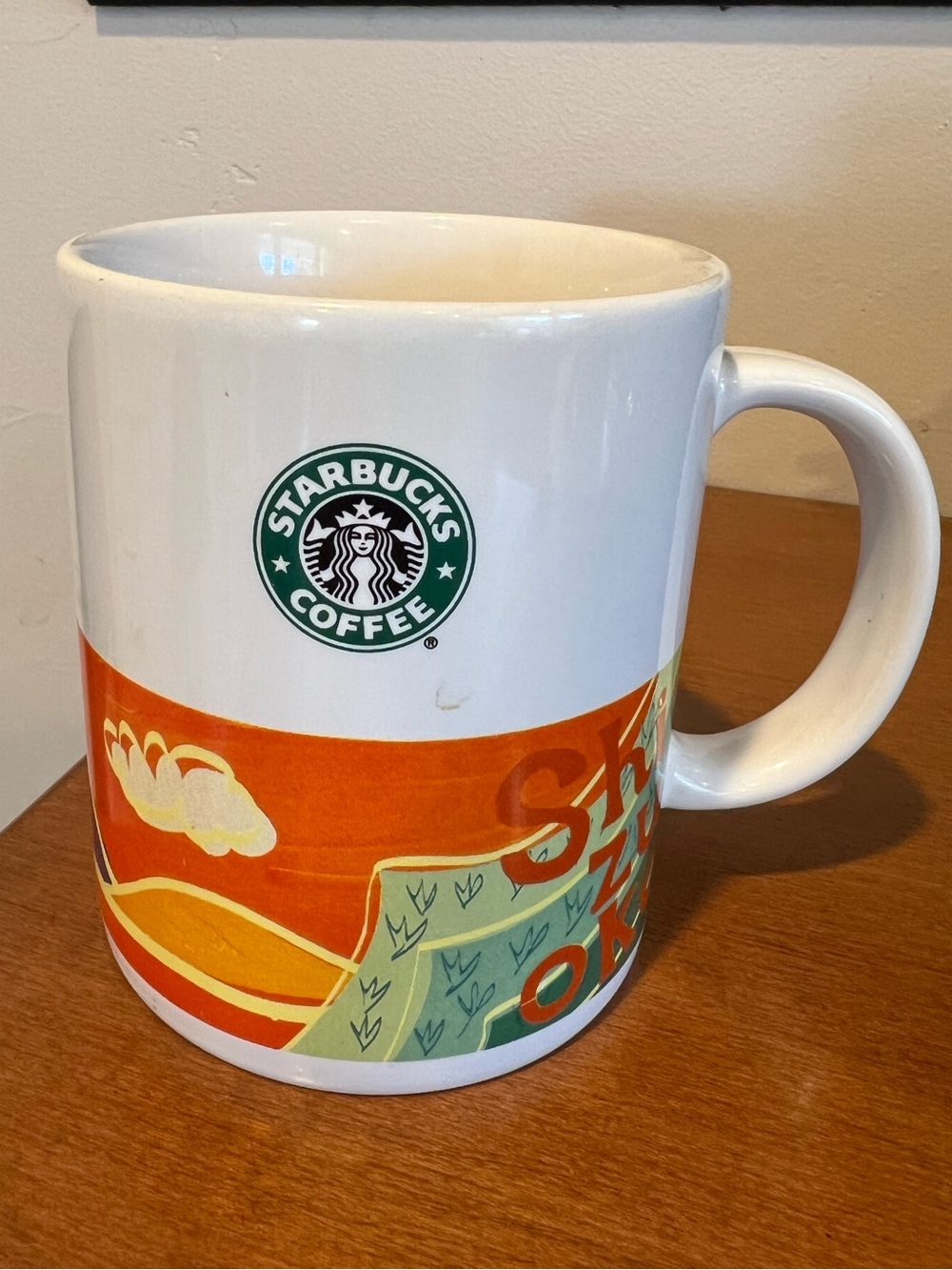Starbucks White Mug with Orange and Green Scenic Band